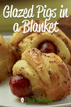 baked pigs in a blanket on a white plate