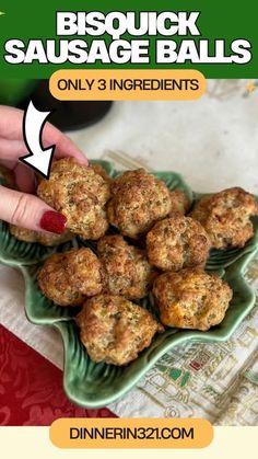 someone is picking up some sausage balls from a green platter on a red and white tablecloth