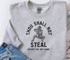 a t - shirt that says thou shall not steal unless you got game on it