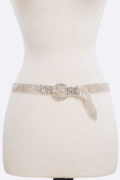 Gorgeous for any outfit that you want to shine in! 1" buckle closure. Fits a waist 26-43". Covered in rhinestone details. Adjustable Silver Belt With Bling, Adjustable Silver Belts With Bling, Silver Bling Belts For Party, Silver Adjustable Belt With Rhinestones, Silver Party Belt With Bling, Silver Rhinestone Belt For Party, Adjustable Rhinestone Party Belts, Silver Fitted Belts For Party, Silver Fitted Belt For Party