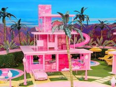 a barbie doll house with pink furniture and palm trees