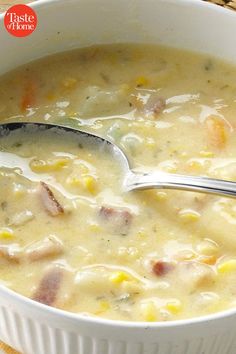 a white bowl filled with soup on top of a table