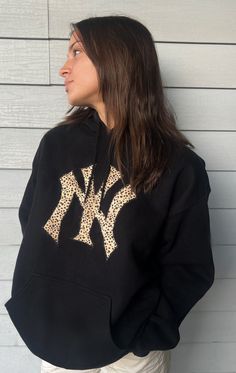 Super comfy black hoodie with NY Yankee Logo! (Can also do other teams & colors DM and ask!) Black Long Sleeve Sweatshirt For Game Day, Black Sweatshirt For Game Day In Fall, Black Team Spirit Sweatshirt With Ribbed Cuffs, Black Sweatshirt For Game Day Sports Season, Black Sweatshirt For Game Day, Black Team Spirit Sweatshirt For Fall, Black Fan Apparel Sweatshirt For Fall, Black Team Spirit Sweatshirt For College, Black Collegiate Sweatshirt For Sports Season