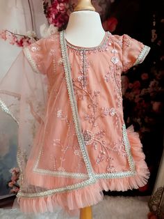 ✨ With its beautiful design and comfortable fit, this pastel peach   Punjabi suit is perfect for any special occasion, whether it's a family function, wedding, or festive celebration. ✨ This pastel peach   Punjabi suit is the perfect outfit for your baby girl, designed to make her look cute and stylish. The kurta is adorned with beautiful embroidery, adding a touch of traditional elegance to the outfit. The peach   colour of the suit is sure to bring out the innocence and playfulness of your lit Festive Peach Fitted Dress, Peach Wedding Sets For Summer, Festive Peach Sets For Spring, Orange Sets For Spring Wedding, Spring Wedding Orange Sets, Spring Festive Peach Dress, Eid Dresses, Punjabi Suits, Stunning Outfits