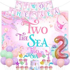 two the sea 2nd birthday party supplies including balloons, streamers and cake toppers