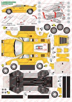 the paper model of a yellow car is cut out and ready to be used for construction