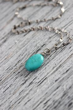 This lovely simple necklace was made of natural turquoise oval stone bead, high quality stainless steel chain, tiny stainless steel separator and stainless steel lobster claw. The chain is from lead free & nickel free metal. Perfect for everyday wear and a great gift for someone special! The length of chain is about 49 cm or about 19.2 inches. The last photo shows a necklace with the same bead size and the same length of chain. Other necklaces of my shop you can see here: https://www.etsy.co Silver Wire Wrapped Necklaces For Everyday, Silver Wire Wrapped Necklace For Everyday, Everyday Silver Wire Wrapped Necklaces, Turquoise Stainless Steel Jewelry As A Gift, Turquoise Stainless Steel Jewelry As Gift, Turquoise Stainless Steel Jewelry Gift, Long Drop Necklace, Big Pearl Necklace, Blue Gemstone Necklace