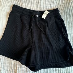 Aerie High Waisted Waffle Shorts. Size Small In Black Color. Matches Alot Of Their Current And Previous Waffle Material Styles. The Quality Feels Nice And Has A Tie String Waist. Material Styles, Aerie Shorts, Oversized Fits, Black Color, High Waisted, Womens Shorts, Women Shopping, Black, Color