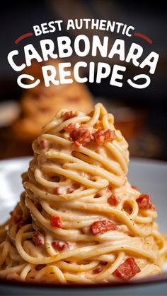 This image features a tall, creamy swirl of carbonara pasta, generously coated with sauce and topped with pancetta or bacon pieces. The text above reads "Best Authentic Carbonara Recipe," making it appealing to those in search of a genuine and indulgent pasta carbonara experience. The presentation emphasizes a rich, smooth, and traditional carbonara. Creamy Carbonara Pasta, Healthy Carbonara, Authentic Carbonara, Carbonara Pasta Creamy, Carbonara Recipe Creamy, Italian Carbonara, How To Make Carbonara, Creamy Carbonara, Pasta At Home