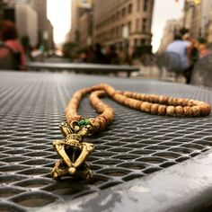 This Mala is made With 108 lotus seeds strung on electric green knotting cord displaying the Vajra or Dorje as the "guru" or focal bead. The vajra is the weapon of the Vedic rain and thunder-deity Indra, and is used symbolically by the dharma traditions of Buddhism, Jainism and Hinduism, often to represent firmness of spirit and spiritual power. Green Hand-strung Spiritual Mala, Traditional Green Necklace For Meditation, Traditional 8mm Bead Jewelry For Festivals, Traditional 8mm Beaded Jewelry For Festivals, Spiritual Wooden Beads Mala For Festival, Adjustable Green Spiritual Mala, Green Adjustable Spiritual Mala, Traditional Green Hand-strung Mala, Handmade Green Spiritual Mala