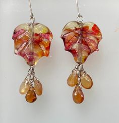 Fall Leaves and Gems Earrings  Enter Fall with beautiful earrings that enhance any outfit!    These lovely hand sculpted  Murano Glass earrings feature faceted Citrine briolettes. They are dangle earrings that are 1.5 inches long. Each leaf is approximately .75 inch wide. With the earwires they are 2.5 inches long. The earwires and findings are all 925 Sterling Argentium which tarnishes less and contains no nickel. The glass is Italian Venetian Murano glass that is imported and comes to me in th Multicolor Faceted Earrings For Gift, Faceted Czech Glass Dangle Earrings, Faceted Czech Glass Earrings As Gift, Czech Glass Faceted Earrings For Gifts, Sculpting Tools, Murano Glass Earrings, Hobby Ideas, Jewelry Making Earrings, Gem Earrings