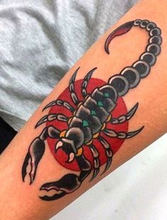 a man with a scorpion tattoo on his arm