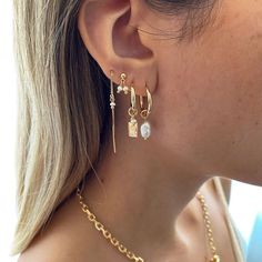 A mix between edge and elegance, the Juli Earring Set is a 5-piece favorite! Featuring a unique assortment of styles with pretty pearl adornments this set makes for a true ear party. Layered Earrings Ear Piercings, Mixing Metals Earrings, Three Piercing Stack, Beachy Earring Stack, Gold Earring Stack Ideas, Gold And Silver Earrings Mixing, Gold Earrings Stack, Silver Earring Stack, Gold Earring Stack