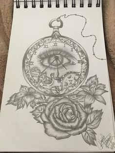 a drawing of a rose with an eye on it and a compass in the middle