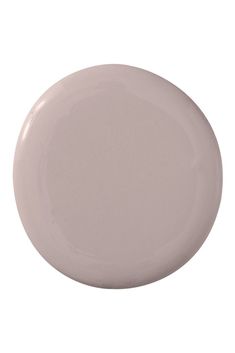 a white plate with a light pink color on the rim and bottom, is shown in front of a white background