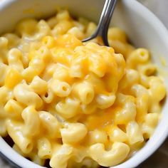 a white bowl filled with macaroni and cheese