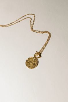 Luxury Vintage Medallion Pendant Necklace, Spiritual Recycled Gold Round Pendant Jewelry, Gold-tone Brass Necklace With Detachable Pendant, 14k Gold Medallion Amulet Jewelry, Luxury Gold Coin Medallion Necklace, Luxury Brass Jewelry With Coin Pendant, Timeless 14k Gold Coin Pendant Necklace, Luxury Gold Medallion Locket Necklace, Luxury Gold Medallion Necklace