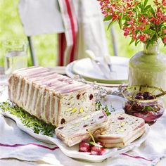 a table with food and flowers on it