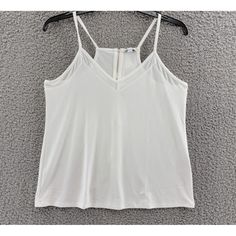 Bar Iii Knit Mesh Cami Tank Top Women'S M Bright White V-Neck Back Zip Closure Bar Iii Knit Mesh Cami Tank Top Women's M Bright White V-Neck Back Zip Closure Retail $39.50 This Bar Iii Knit Mesh Camisole Tank Top Is Perfect For A Casual Occasion. The V-Neckline And Spaghetti Straps Provide A Comfortable Fit, While The Back Zip Closure Adds A Stylish Touch. The Bright White Color And Solid Pattern Make It Easy To Pair With Any Outfit. Made From A Blend Of Polyester And Spandex, This Tank Top Knit Mesh, Tank Top Camisole, Tank Top Cami, Cami Tanks, Top Women, Solid Pattern, Bright White, White Color, Tank Tops Women