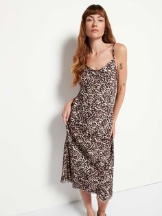 A luxe slip with a frayed bottom hem and adjustable straps. Cut on the bias, it will naturally form to your body in the most flattering way. (This one comes in Safari.) | Women's Sofia Slip Midi Dress in Safari Print | Ethical Essentials Spring Loungewear Slip Dress With Spaghetti Straps, Summer Cami Slip Dress For Loungewear, Summer Slip Dress With Built-in Bra For Loungewear, Chic Midi Dress With Spaghetti Straps For Loungewear, Chic Slip Dress With Adjustable Straps For Sleep, Sleeveless Slip Dress Bias Cut For Loungewear, Sleeveless Bias Cut Slip Dress For Loungewear, Spring Cami Slip Dress For Loungewear, Loungewear Slip Dress With Adjustable Spaghetti Straps