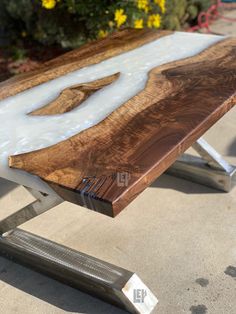 a wooden table with white frosting on it