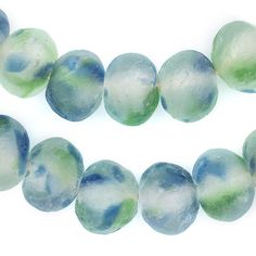 a strand of blue and green glass beads