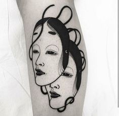 a woman's face with hair blowing in the wind tattoo on the right thigh