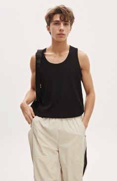 Our Slim Tapered Ribbed Tank Top is an essential addition to your wardrobe. Featuring a classic ribbed design, it can be worn alone, or layered under a button shirt or jacket for a more formal look. Perfect for any casual occasion, this tank top pairs easily with any pants or shorts.
Gender: MenMaterial: PolyesterClothing Length: RegularSleeve Length: SleevelessCollar Type: Round Neck Casual Ribbed Crew Neck Vest, Casual Ribbed Sleeveless Top, Versatile Ribbed Tank Top For Fall, Classic Ribbed Tank Top For Spring, Casual Ribbed Vest For Everyday Wear, Casual Everyday Ribbed Vest, Casual Ribbed Summer Vest, Ribbed Crew Neck Vest For Layering, Fitted Casual Everyday Vest