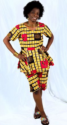 Women's Ankara African 2 piece set- Top and shorts. 100% cotton fabric. Sizes can be made according to order. Model is 5'8" and wears Medium. Cotton Short Set With Built-in Shorts, Cotton Matching Short Sets, Cotton Sets With Built-in Shorts, Yellow Cotton Matching Set, Fitted Cotton Two-piece Set, Cotton Short Set With Built-in Shorts And Short Sleeves, Casual Yellow Ruffled Sets, Fitted Cotton Sets With Short Shape, Fitted Cotton Peplum Top With Short Sleeves