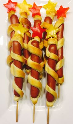 hotdogs wrapped in strips with stars on them