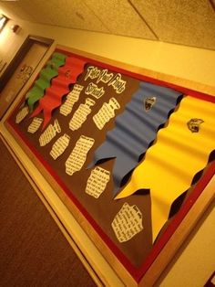 a bulletin board that has been decorated with different colors and shapes, including the words