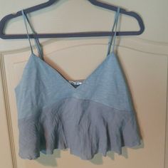 Blue Grey Top So Soft And Pretty From Urban Outfitters Never Worn! Gray V-neck Crop Top For Summer, Gray Summer Tops For Day Out, Chic Gray Cotton Tank Top, Casual Light Blue Tank Top With Spaghetti Straps, Casual Light Blue Spaghetti Strap Tank Top, Casual Gray Tops With Spaghetti Straps, Casual Gray Spaghetti Strap Tops, Chic Gray Spring Tank Top, Chic Gray Tank Top For Spring