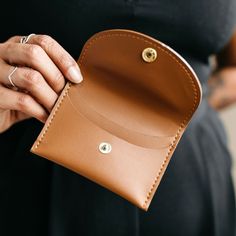 The Minimalist wallet is the perfect compact style that holds the right amount of essentials. It features two inside pockets and a snap closure. Made with vegan cactus leather. Dimensions: 4 3/8" x 3 1/4" Leather Supplies, Minimalist Wallet, The Minimalist, Leather Gifts, Nice Leather, Personalized Leather, Leather Bags, Inside Pocket, Snap Closure