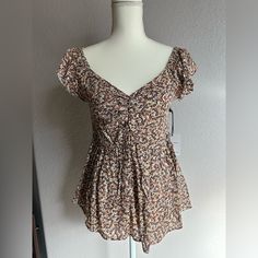 Jopra Top Color: Brown Floral Size: Medium New With Tag, Never Worn Summer Brown Tops With Floral Print, Summer Brown Floral Print Blouse, Sugarhigh Lovestoned, Yellow Tees, Layered Shirts, Basic Shorts, Ladies Tee Shirts, Oversized Top, American Shirts