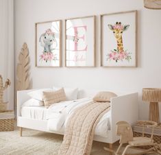 a child's bedroom with two giraffes on the wall