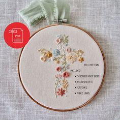 a cross is shown with the instructions to make it look like it has flowers on it