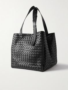 Bottega Veneta's heirloom-worthy tote bag has been crafted in Italy from strips of supple leather in the label's signature intrecciato weave. It's roomy enough to carry your essentials, making it a smart choice for long commutes. Leather Intrecciato Weave Hobo Tote Bag, Black Intrecciato Weave Hobo Tote Bag, Designer Black Bag With Intrecciato Weave, On-the-go Woven Leather Tote Bag, Leather Intrecciato Weave Tote Bag, Bottega Veneta Jodie, Oxblood Leather, Black Leather Tote Bag, Latest Bags