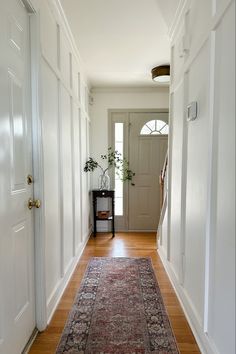 Narrow entryway
Narrow hallway
Simple hallway
Board and batten
Simply white paint from Benjamin Moore Board And Batten Small Entryway, Floor To Ceiling Board And Batten Entryway, Molding In Hallway, Board And Batten Height Hallway, Tall Board And Batten Entryway, Board And Batten Entryway With Shoe Storage, Board And Batten Hallway Entryway, Board And Batten Hallway, Narrow Hallway Decor