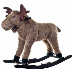 a stuffed animal on a wooden rocking horse