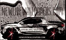 a black and white photo of a car with the word stering silver on it