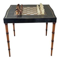 a chess board and pieces on a table