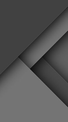 an abstract black and white background with diagonal shapes