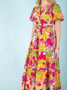 Indulge in the beauty and charm of summer with our Daffodil Garden Maxi Dress. Featuring a vibrant floral print, this dress is the perfect addition to your wardrobe. Made with lightweight material and a flowing design, it offers both style and comfort. Make a statement and brighten up any occasion with this must-have dress! Material: 50% Cotton, 50% Rayon Care: Machine wash cold. Tumble dry. Size. Fits true to size. Tropical Print V-neck Midi Dress For Garden Party, Summer Midi Dress With Vibrant Print For Garden Party, Multicolor Print Sundress For Garden Party, Multicolor Floral Midi Dress For Beach, Multicolor Floral Dress With Vibrant Print For Garden Party, Vibrant Multicolor Floral Dress For Garden Party, Summer Sundress With Vibrant Print For Garden Party, Summer Multicolor Print Midi Dress For Garden Party, Summer Garden Party Multicolor Print Maxi Dress