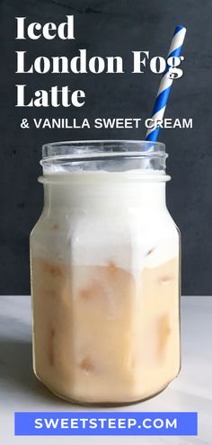 iced london fog latte and vanilla sweet cream in a mason jar with a blue striped straw