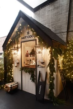 a small store with christmas decorations and lights