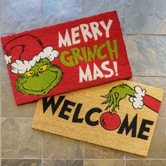 The Grinch may have “hated Christmas and the whole Christmas Season”, but he surely loves these 2-Pack Coir Welcome Mats featuring his iconic green face. A great way to welcome guests to your home during the holiday season these coir mats are durable and have a non-skid backing. Sold as a 2-pack to provide options for both front and back door or gift one to your favorite Grinch loving friend. Merry Grinch-Mas to all! GERTMENIAN 2-ft x 3-ft Grinch Welcome Coir Rectangular Indoor or Outdoor Decorative Novelty Door Mat | 19594 Grinch Doormat, Grinch Door, Dr Seuss Grinch, Door Mat Diy, Whoville Christmas, Hate Christmas, Merry Grinchmas, Christmas Rugs, Coir Mat