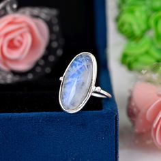 》D E T A I L S《 ✦Stone :- Moonstone ✦Stone Size:-12x24 MM  ✦Stone Shape:- Oval ✦Stone Type:- Natura ✦Metal:-  Silver ,  ✦Purty:- 925 Sterling Silver ✦Weight:- 6 Gram (Approx) ✦Ring Size:- All Size Available 》C U S T O M I Z E O R D E R《 We accept custom and personalized order. It can be change in the gemstone, earring design and earring size. Please send us message if you are interested in a custom creation. 》 P A C K A G I N G 《 Your jewelry will be nicely packaged. If one or more items are gif Oval Moonstone Ring With Stones, Oval Opal Ring Gift, Blue Moonstone Rings With Natural Stones, White Oval Ring With Stones, White Oval Rings With Stones, Blue Stone Ring, Fancy Gifts, Moonstone Stone, Boho Ring