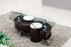 a modern coffee table with two stools and a glass top on carpeted area