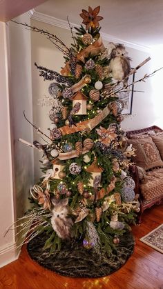 a decorated christmas tree in a living room