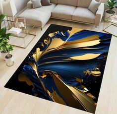 a living room area rug with blue and gold designs